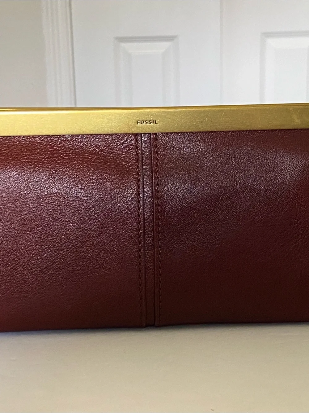 Fossil Burgundy Red Brown Sleek Leather Clutch Wallet with Gold Accent NEW
